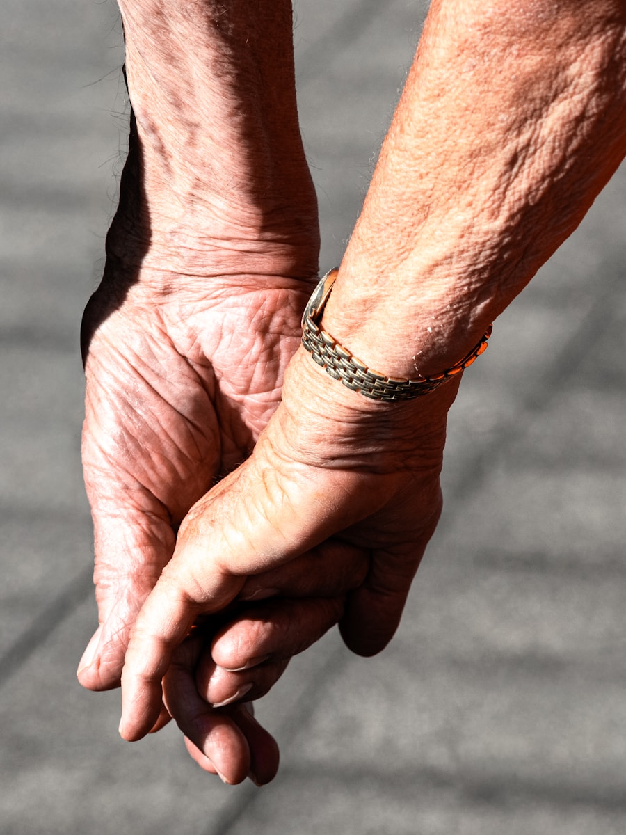 Elderly couple's hands held together — a moment of quiet love